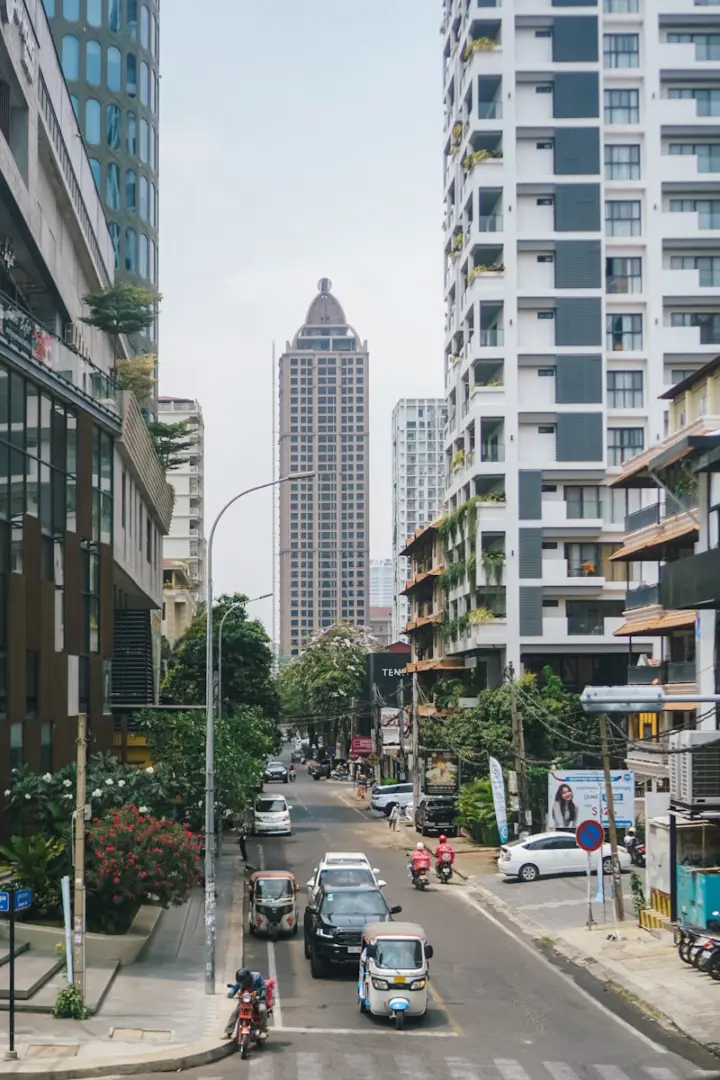 a city street filled with lots of tall buildings
