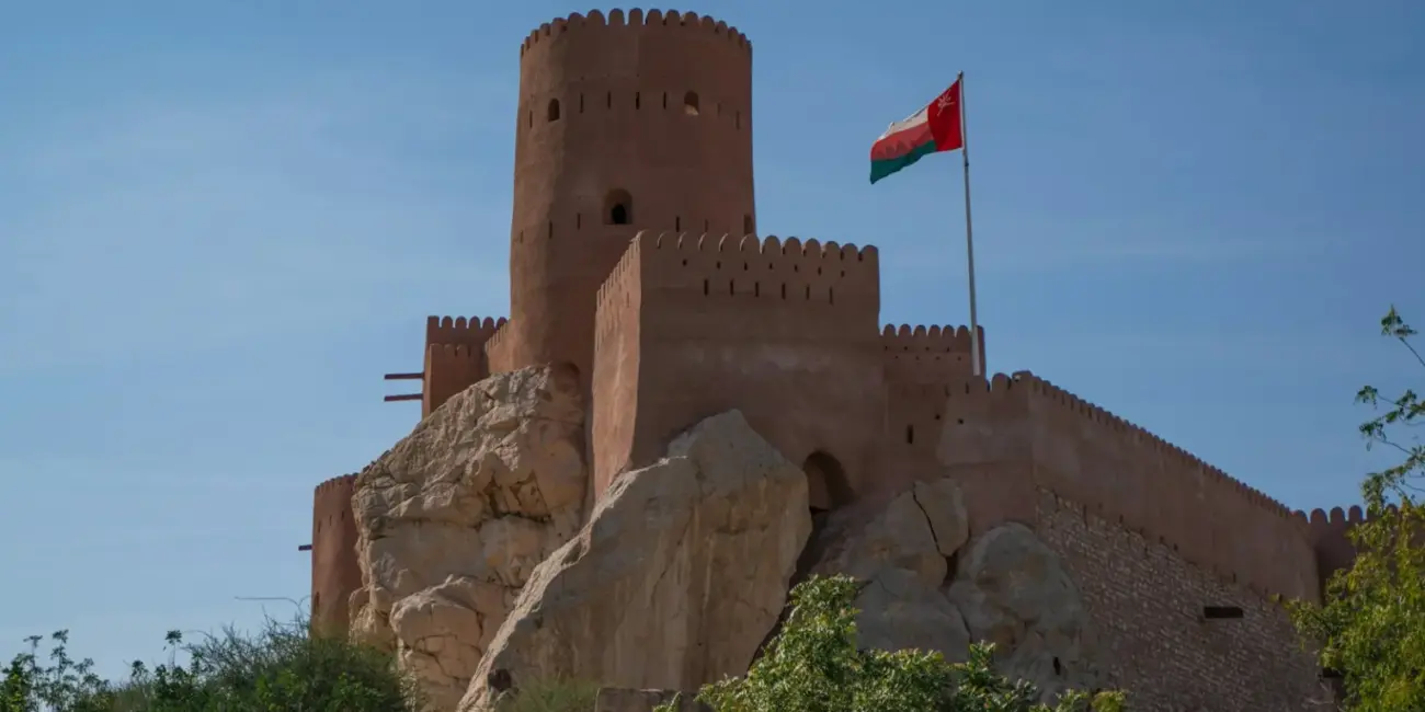 Výber peňazí v Ománe