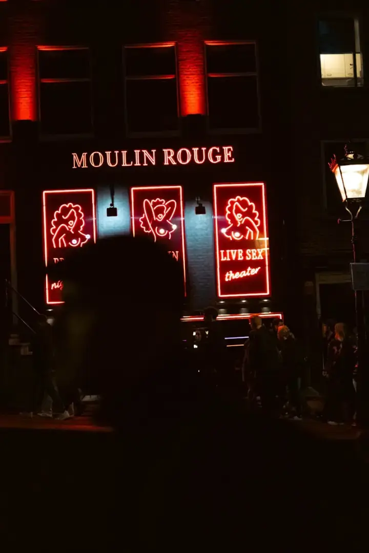 Photo by Vik Molina Moulin rouge theater with neon signs at night