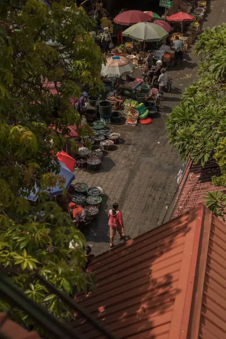 Photo by Dendy Darma Satyazi people walking on sidewalk during daytime