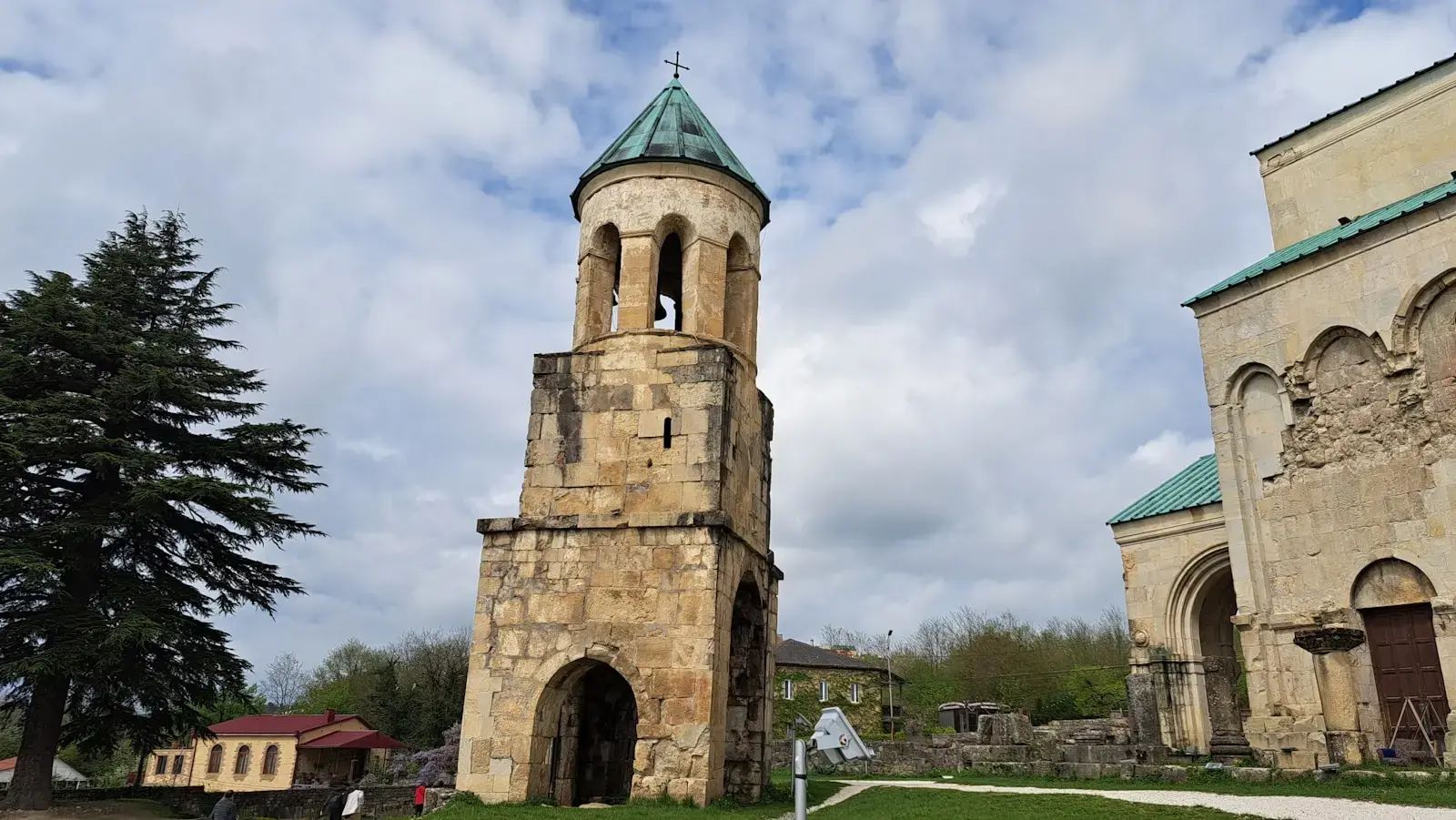 A church with two towers and a green roof