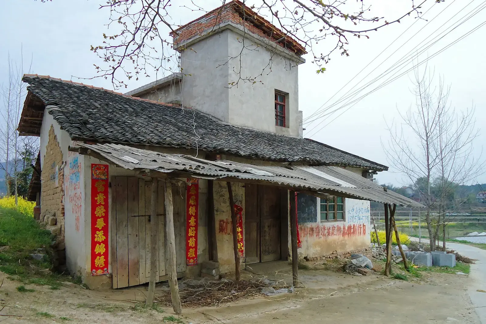 Photo by Kun Zhan a house with a broken roof