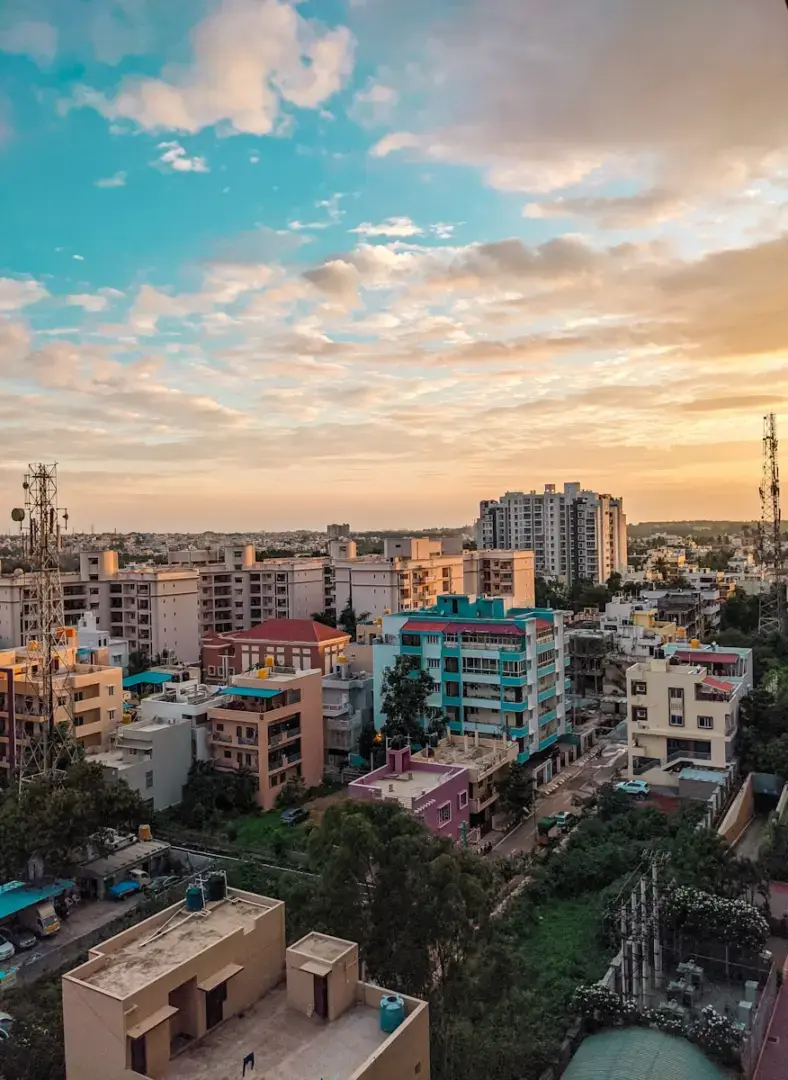 Photo by Vishwanth Pindiboina high rise buildings under blue sky during daytime