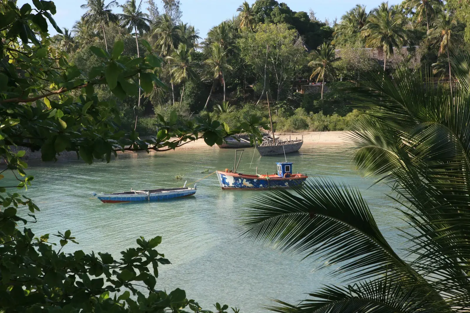 a couple of boats that are sitting in the water