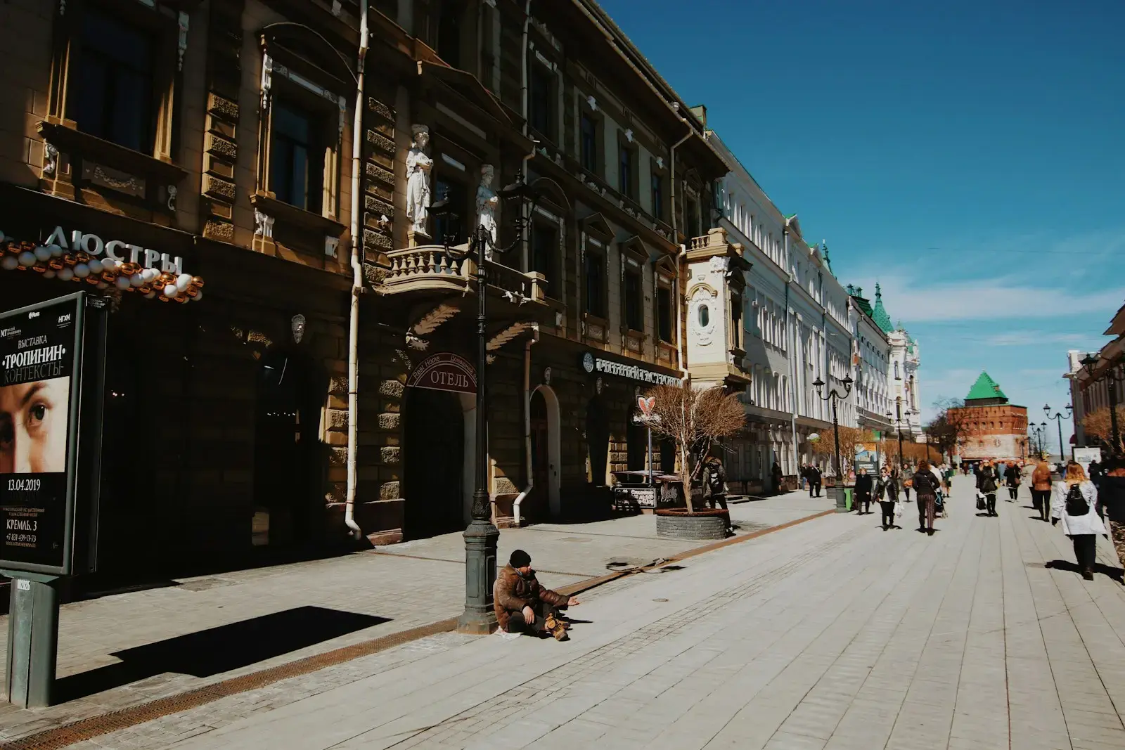 Photo by Artem Bryzgalov people walking near outdoor during daytime
