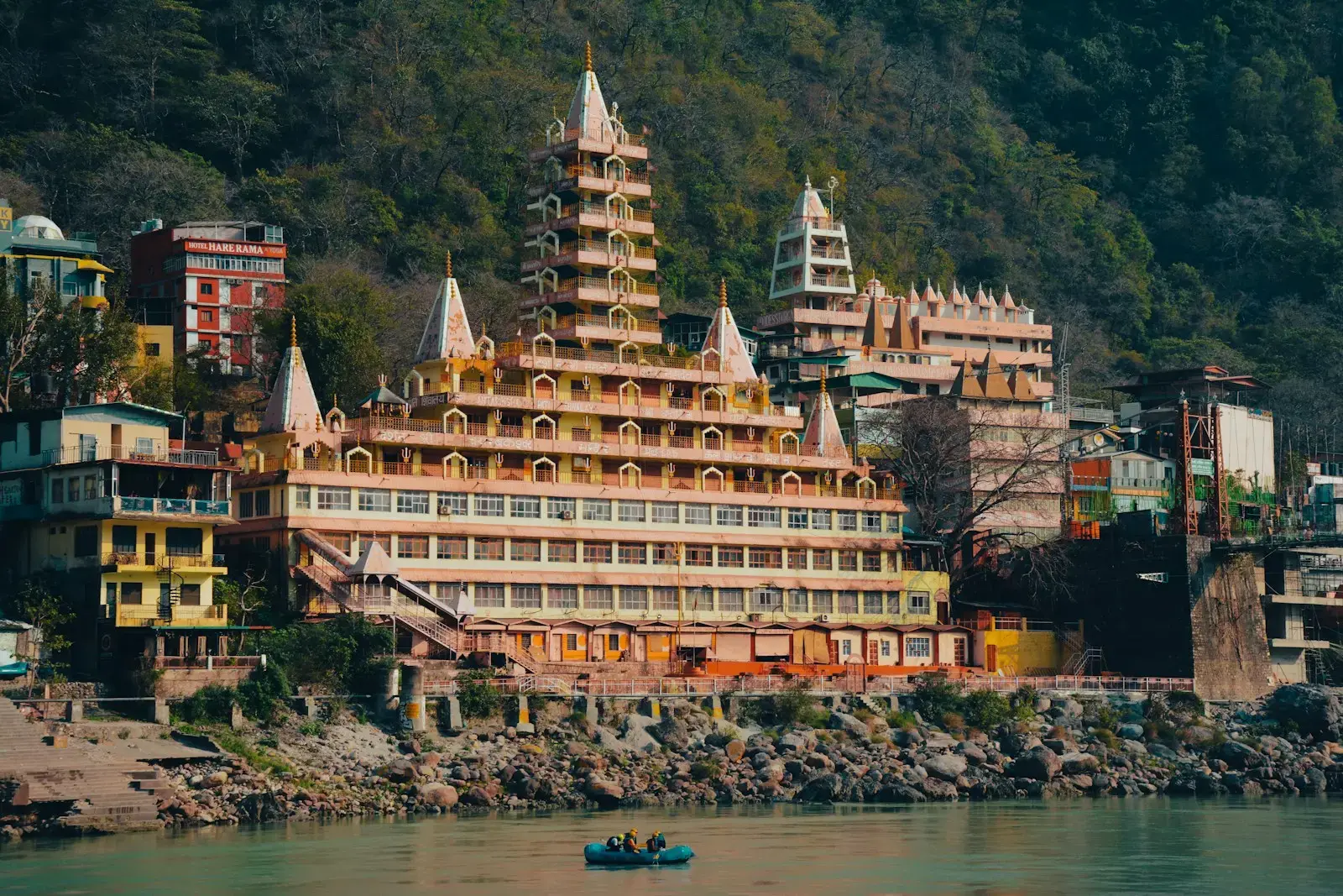 A large building sitting on top of a body of water