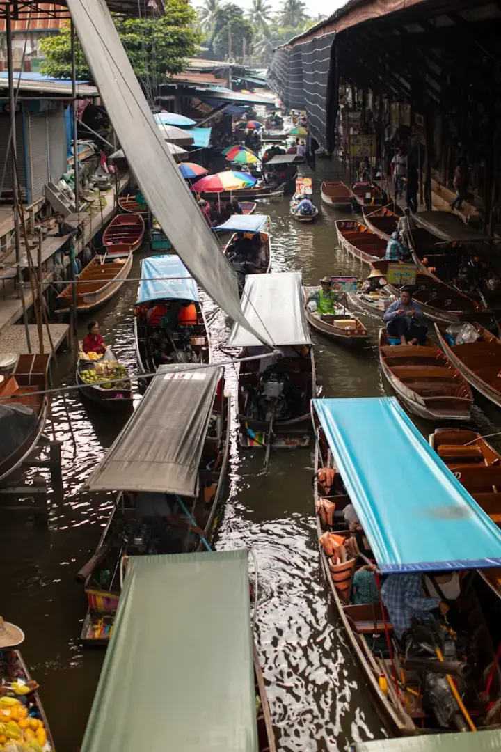 Photo by Leo_Visions A group of boats that are sitting in the water