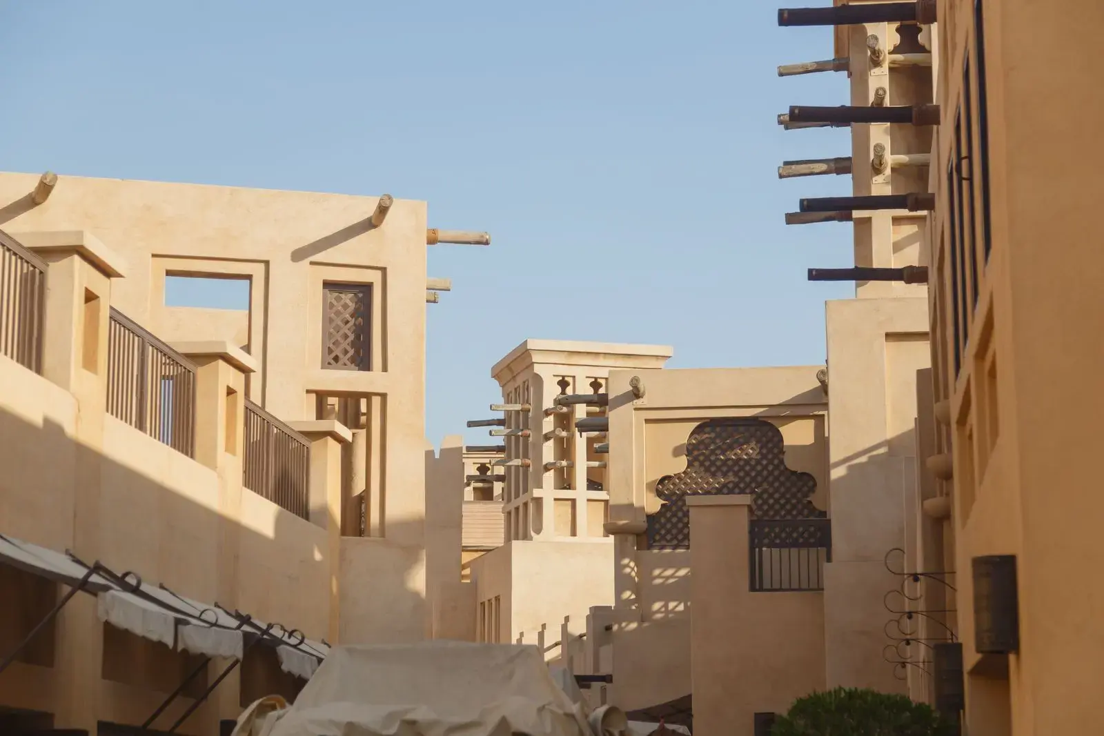 Embrace the blend of traditional and contemporary architectural styles in Dubai, showcasing unique building designs.