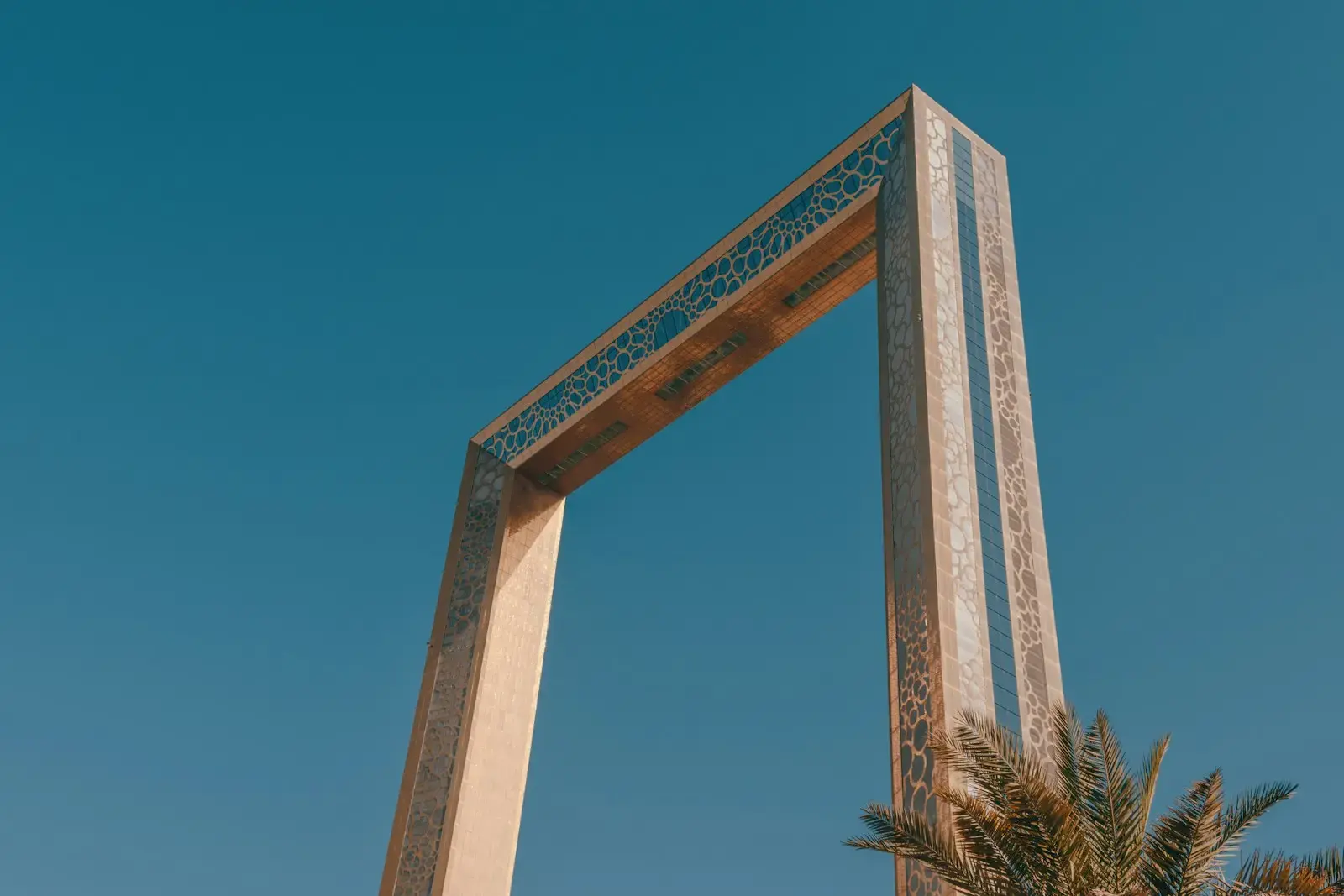 Photo by Petar Avramoski a tall monument with a blue sky in the background