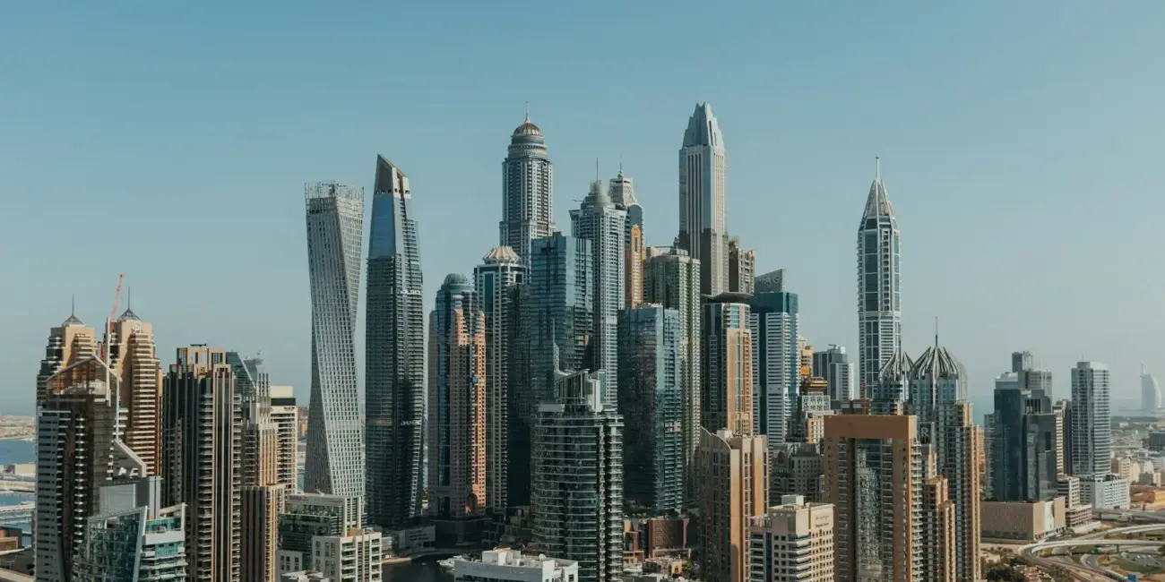 An aerial view of a city with tall buildings