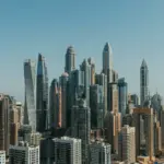 An aerial view of a city with tall buildings